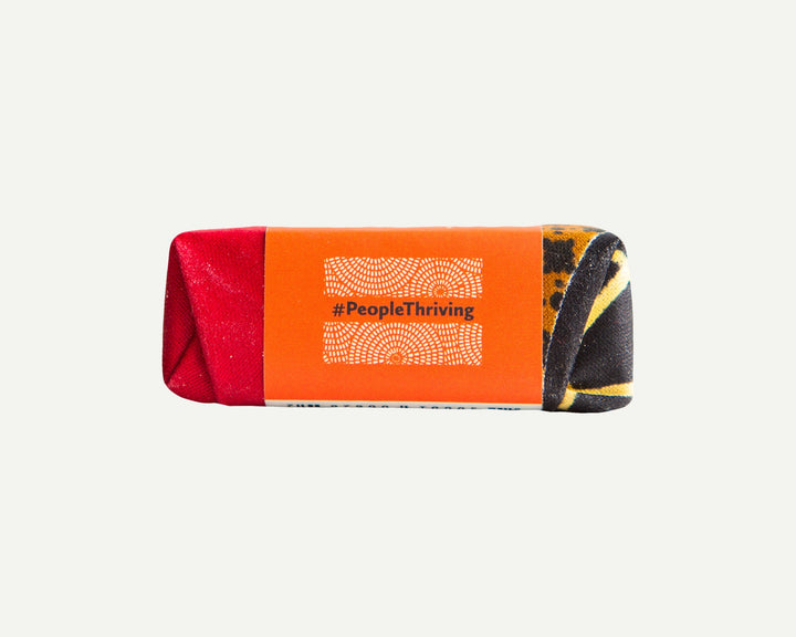 Handcrafted clove soap bar with a textured surface and natural ingredients.