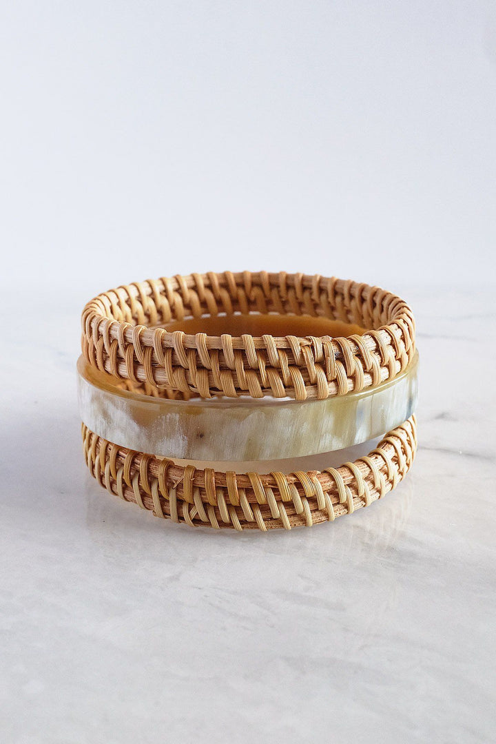 Handwoven set of cream buffalo horn and rattan bangles.