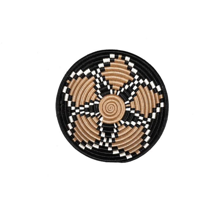 Tea Blossom woven bowl in tea-dyed tan with black and white checkered spokes.