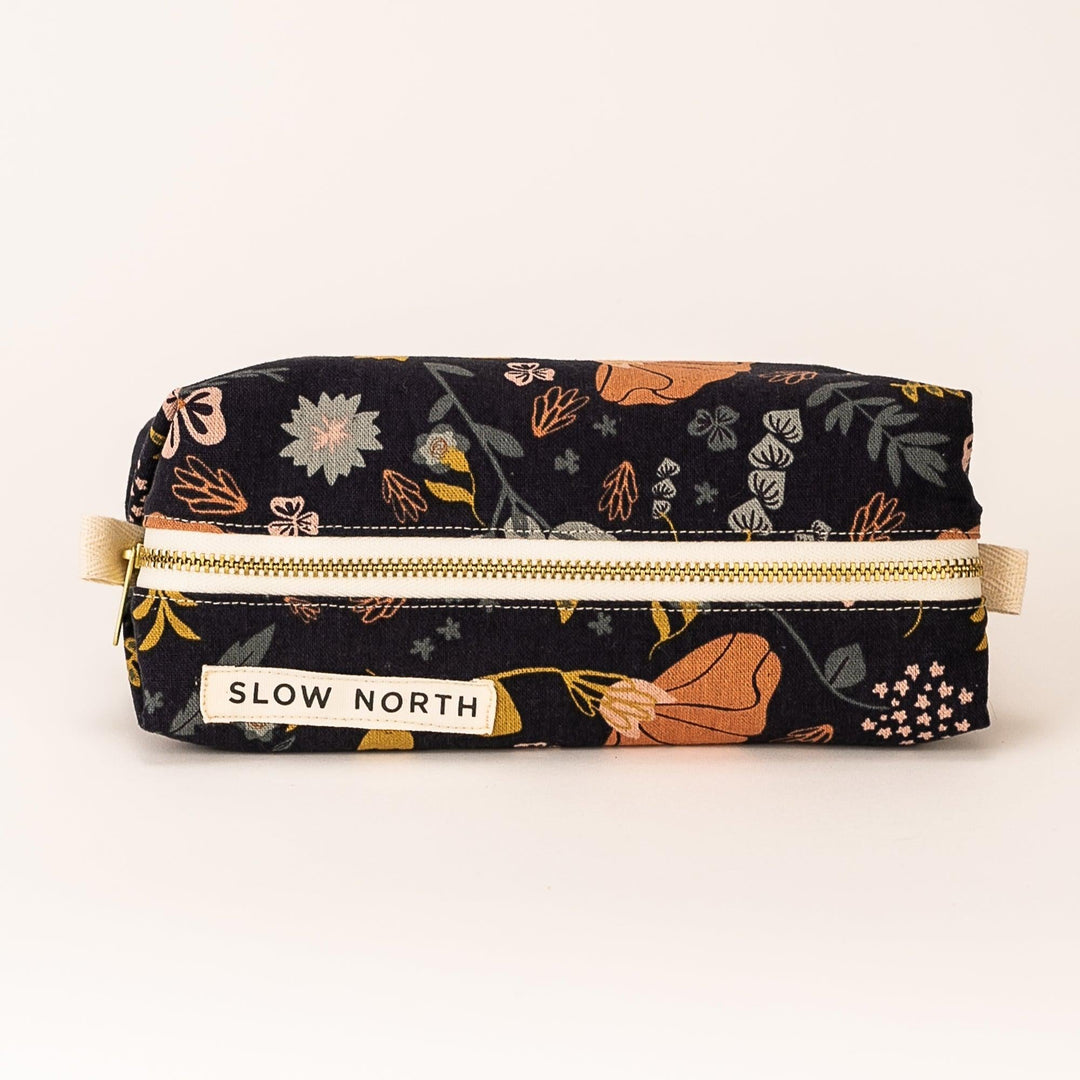 Canyon Springs travel pouch in natural cotton-linen with neutral earthy tones.