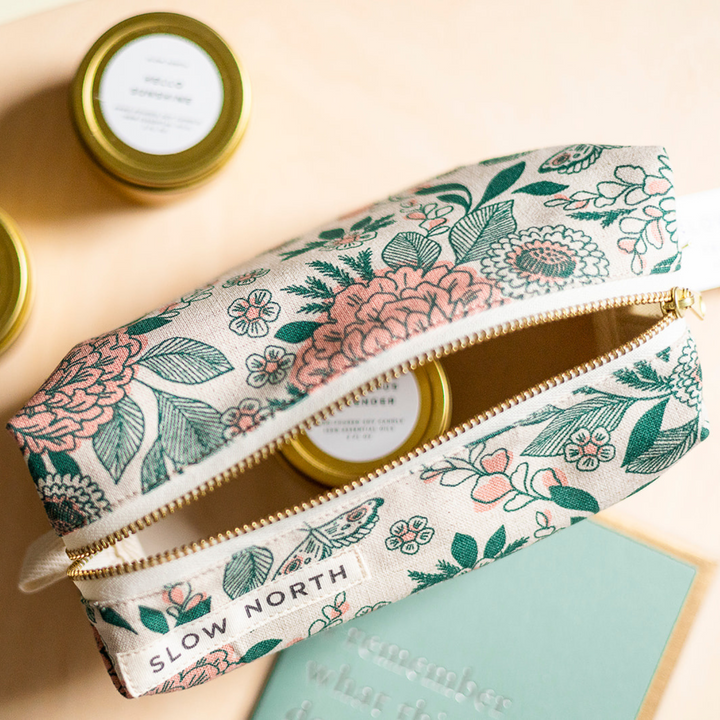 Cotton-linen travel pouch with patterned exterior and self-standing form.