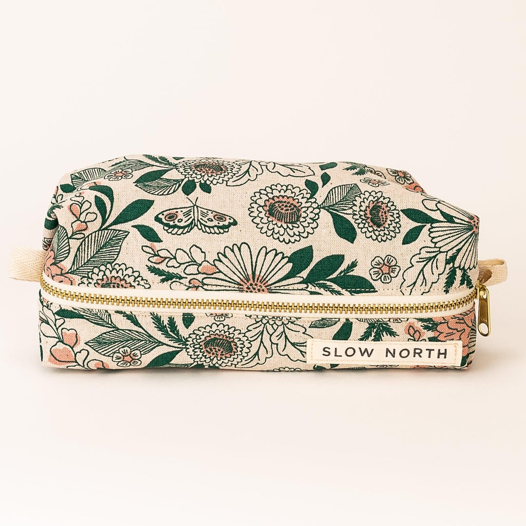 Hidden Falls travel pouch with patterned cotton-linen exterior and zipper closure.
