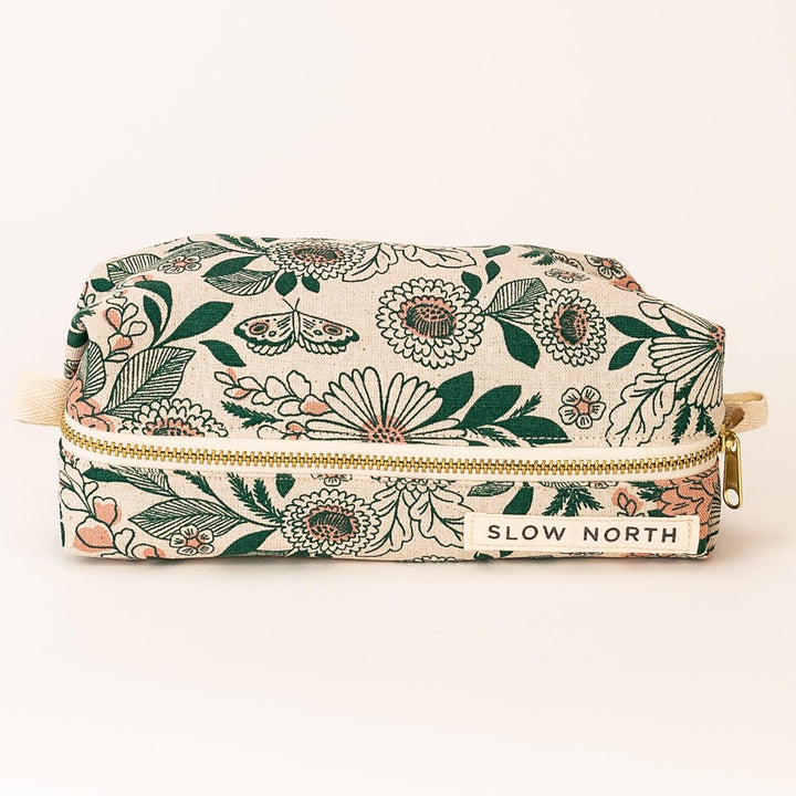 Hidden Falls travel pouch with patterned cotton-linen exterior and zipper closure.