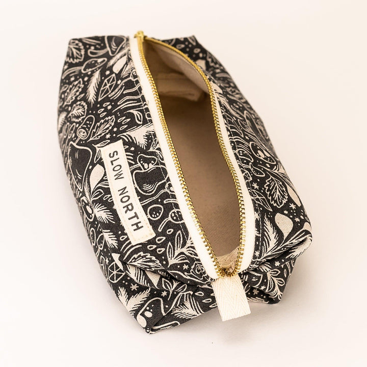 Mystical Mushroom pouch shown with detailed mushroom print and zip closure.