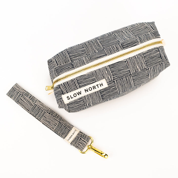 Haystack travel pouch with compact structured design and durable fabric.