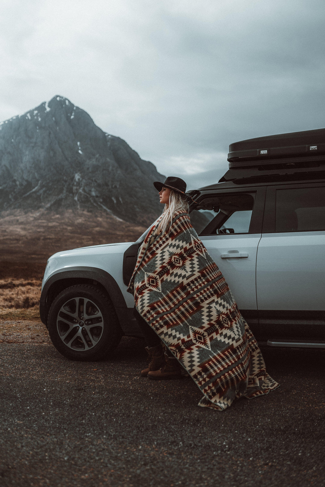 Mint Andean throw blanket showing the full geometric pattern.