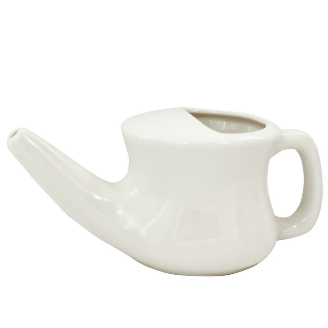 Lead-free ceramic neti pot for nasal rinsing, with a smooth, ergonomic design.