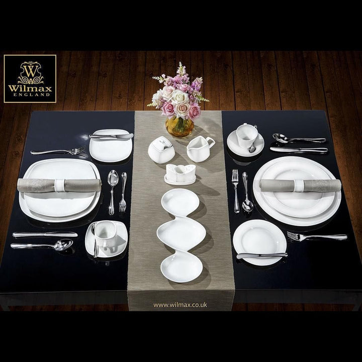 Porcelain divided sauce dish with three compartments, for sauces and condiments.
