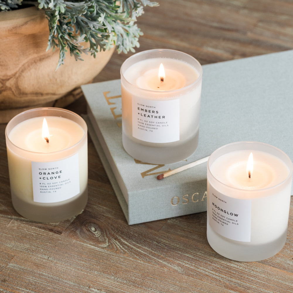 Warm Comforting Candle Trio with three essential oil-scented candles in glass holders.