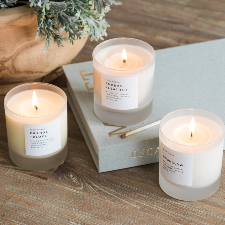 Warm Comforting Candle Trio with three essential oil-scented candles in glass holders.