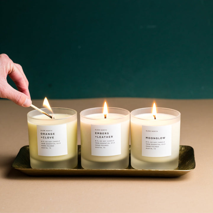 Warm Comforting Candle Trio with three essential oil scented candles in glass holders.