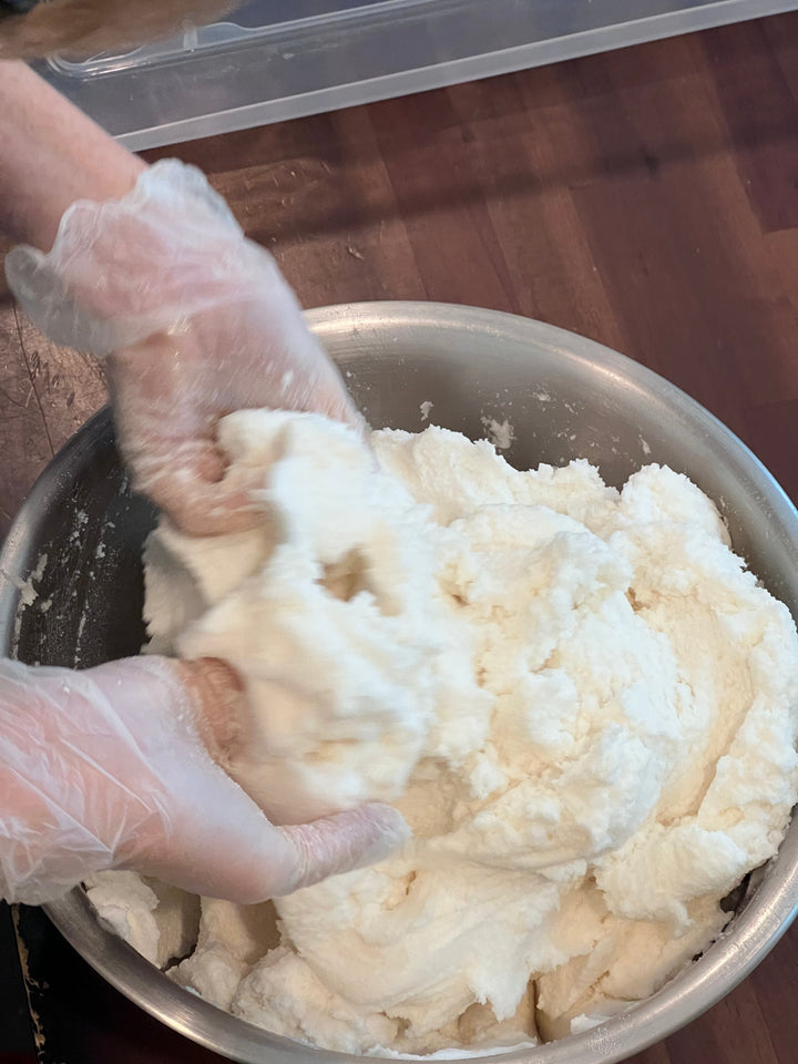 Organic whipped sugar body scrub, creamy and fluffy in a jar.
