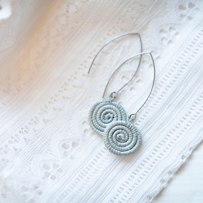 Ice blue hand-woven sisal earrings, lightweight with intricate weaving.