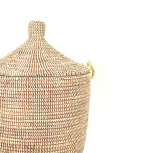 Natural lidded storage basket, woven with a fitted lid for organizing essentials.