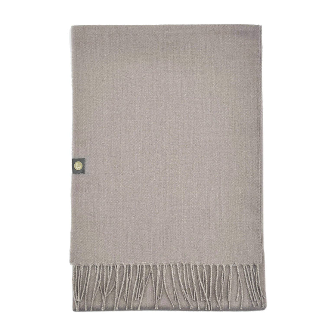 Handwoven baby alpaca throw blanket in hazelnut, 51 by 71 inches with a brushed finish.