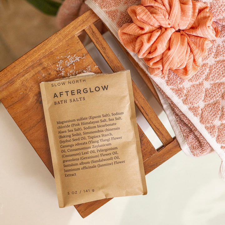 Floral-scented bath salts with colorful crystals and aromatic botanicals.