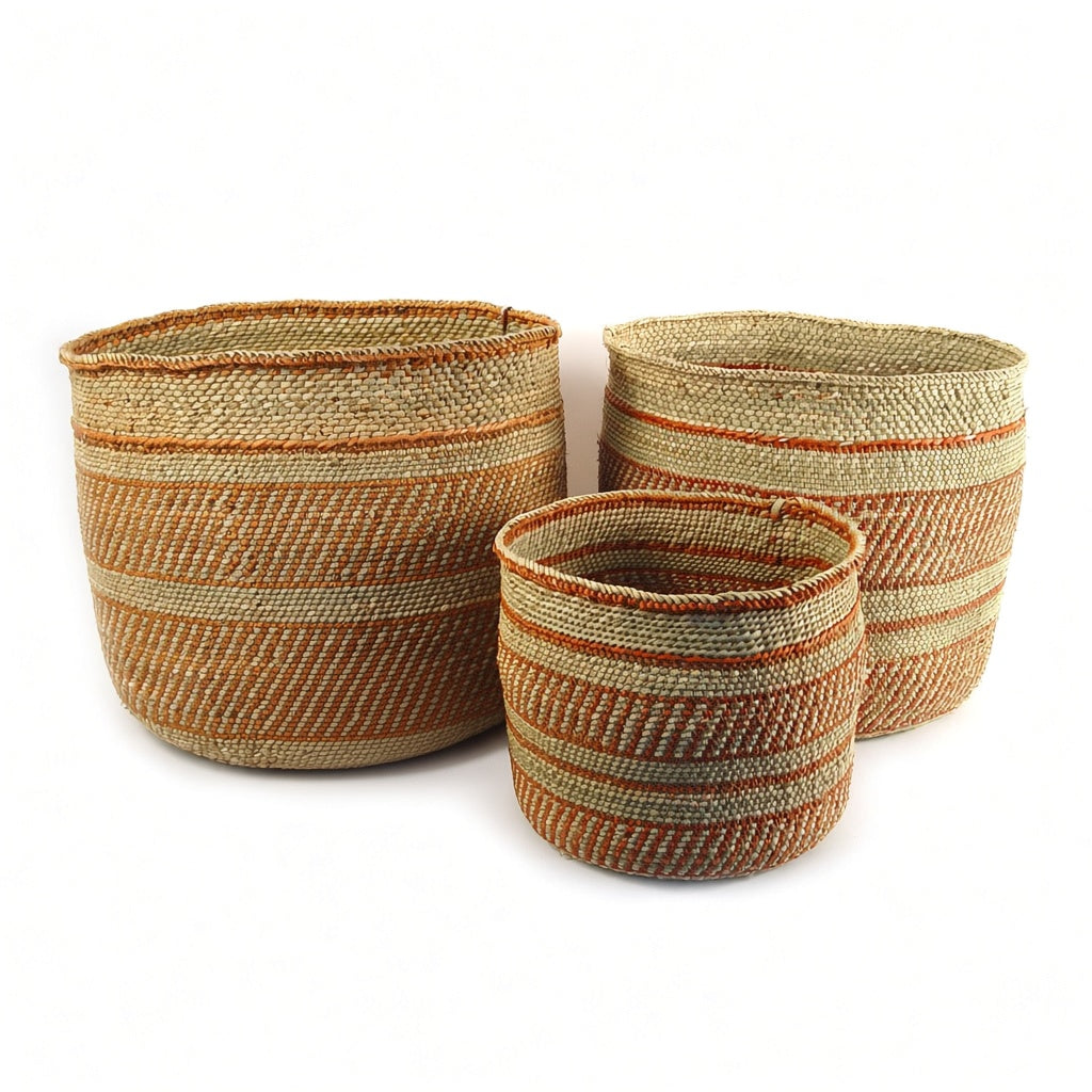 Three Auburn Stripe Iringa baskets in medium, large and extra large, each banded differently