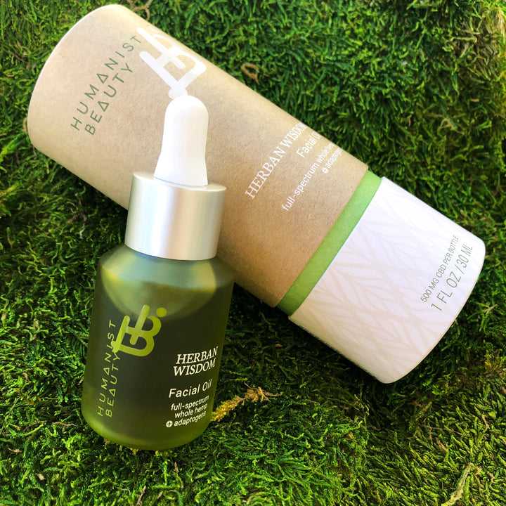 Herban Wisdom facial oil full-size bottle with a dropper applicator.