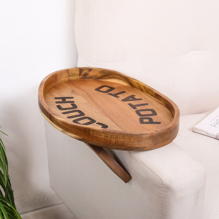 Couch Potato Clip-On Sofa Tray made of acacia wood, designed to attach securely to sofa armrests for convenient use.