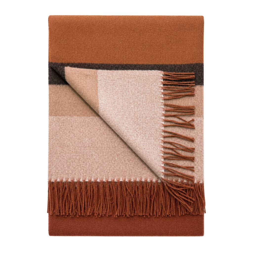 Handwoven baby alpaca throw blanket in russet, 51 by 71 inches with a brushed finish.