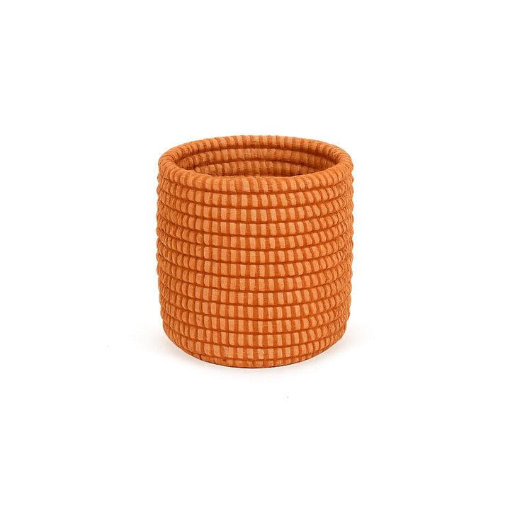 Handwoven mini basket planter with a natural, rustic design.