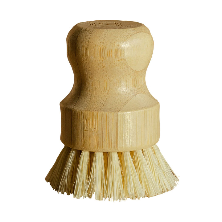 Bamboo and sisal dish brush with natural bristles, showing the wooden handle and bristle side for dish cleaning.