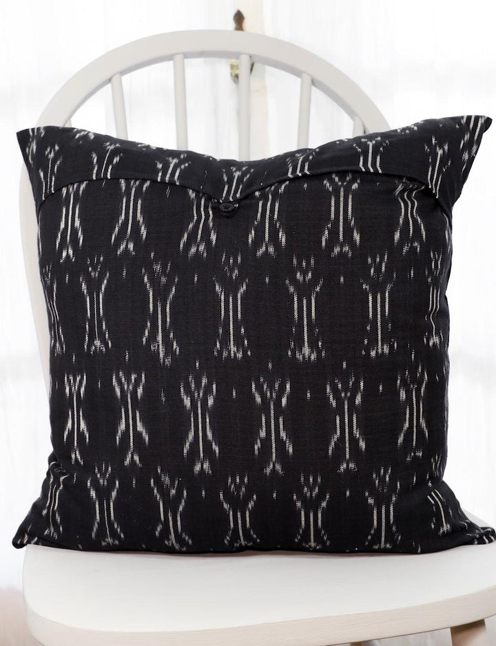 Handwoven black and white ikat cotton throw pillow cover.