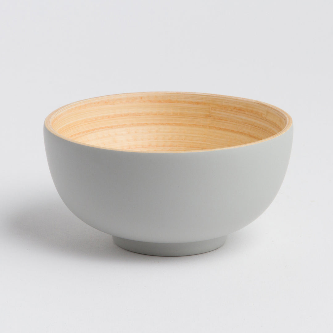 Handcrafted bamboo dining bowl with a smooth natural finish.