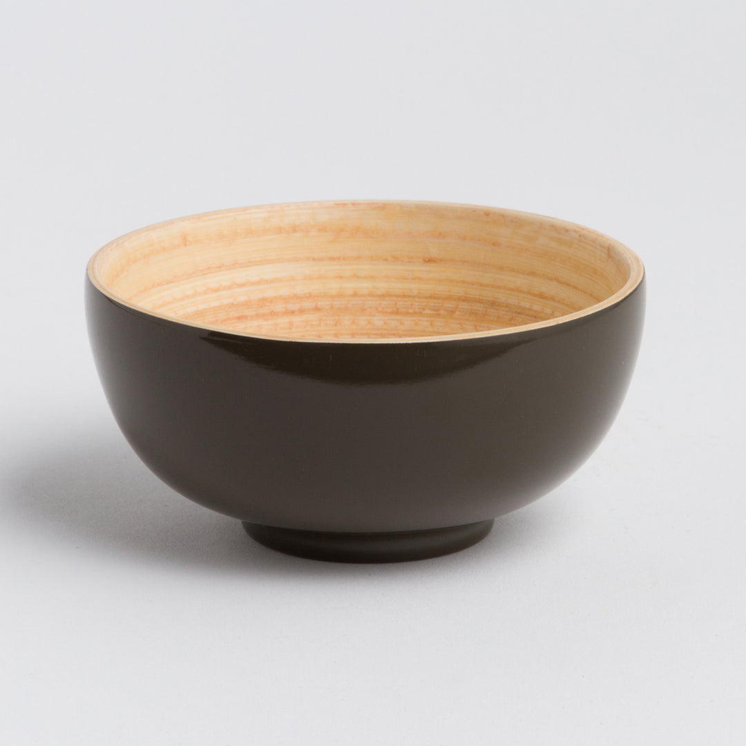 Handcrafted bamboo dining bowl with a smooth, natural finish.
