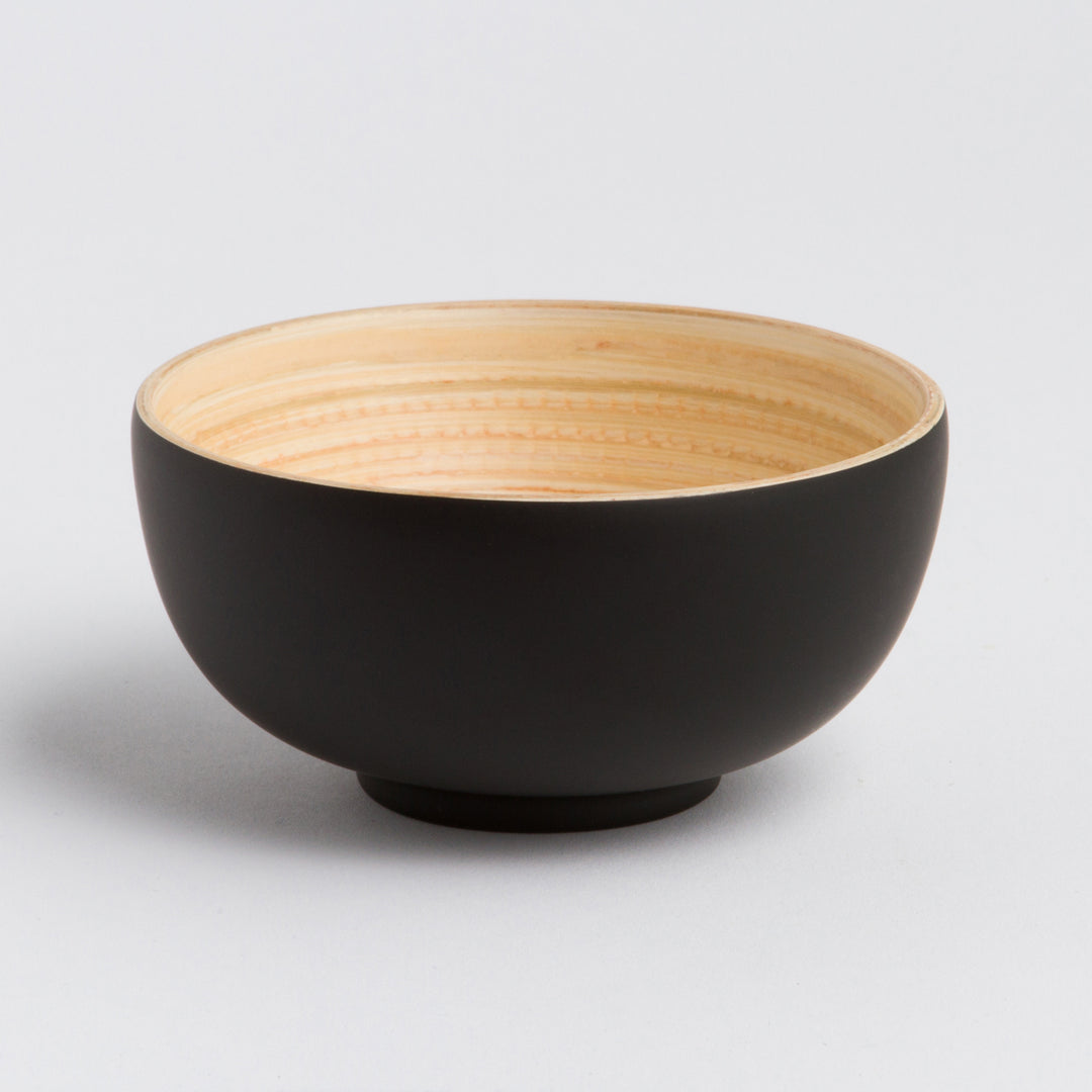 Handcrafted bamboo dining bowl with a smooth natural finish.