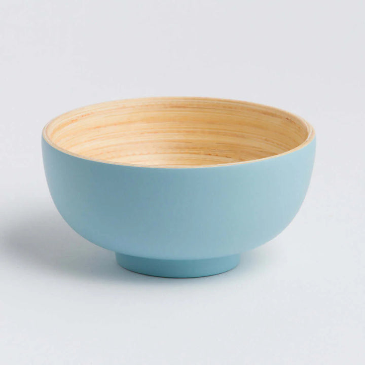 Handcrafted bamboo dining bowl with a natural finish.