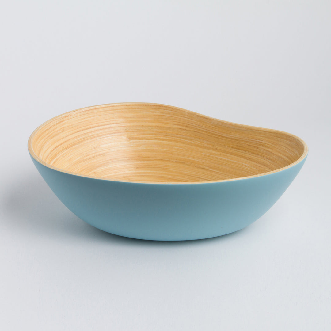 Bamboo serving bowl shaped like a mango, for snacks or salads.