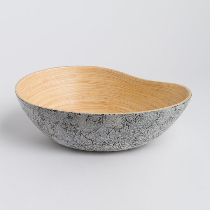Bamboo serving bowl shaped like a mango, for salads and snacks.