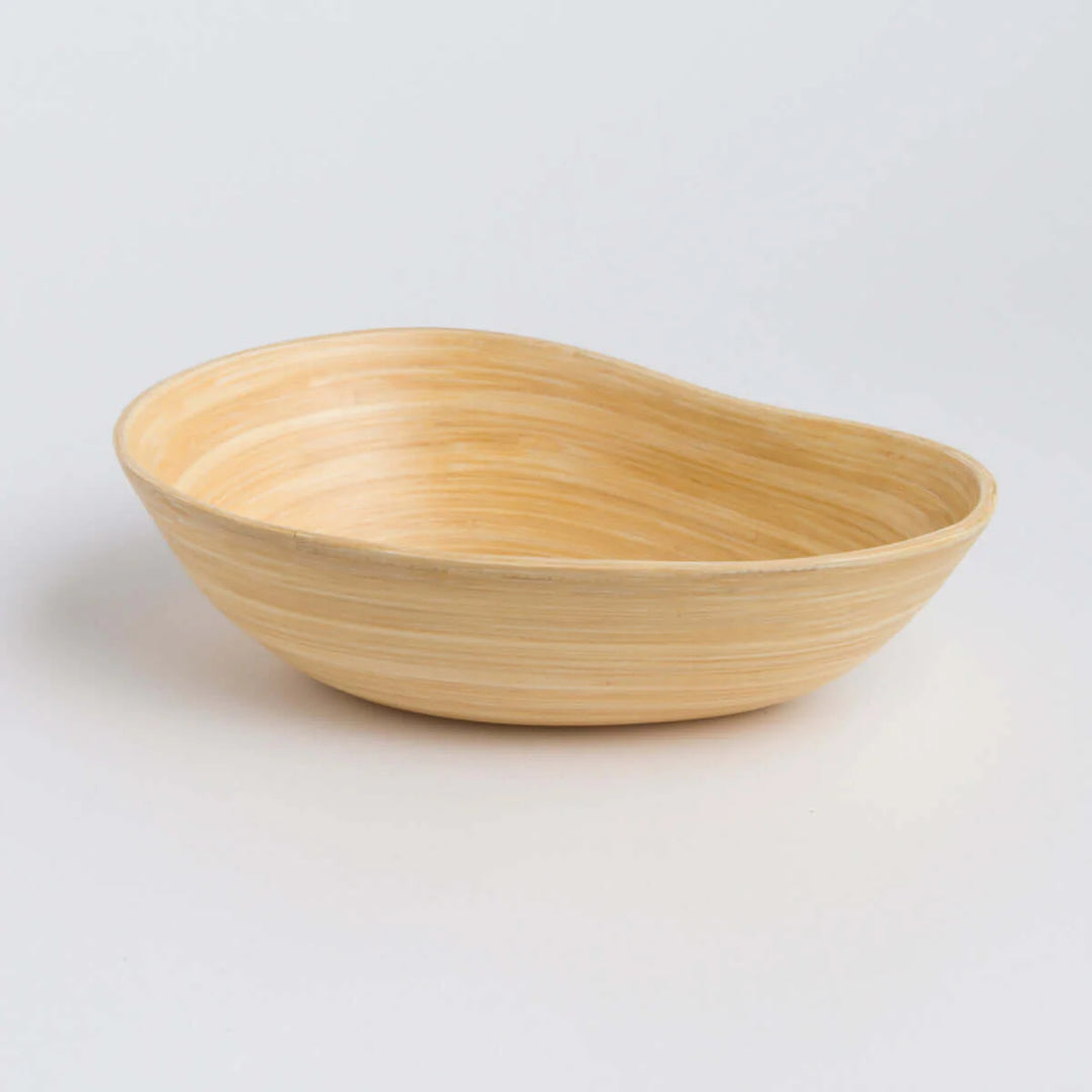 Bamboo serving bowl shaped like a mango, for snacks or fruit.