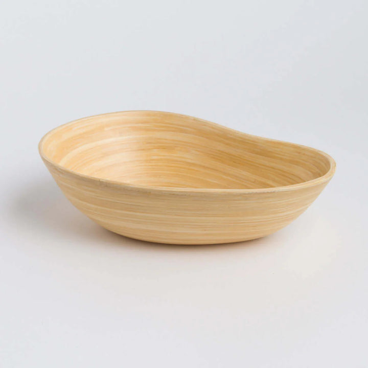 Bamboo serving bowl shaped like a mango, for snacks or fruit.