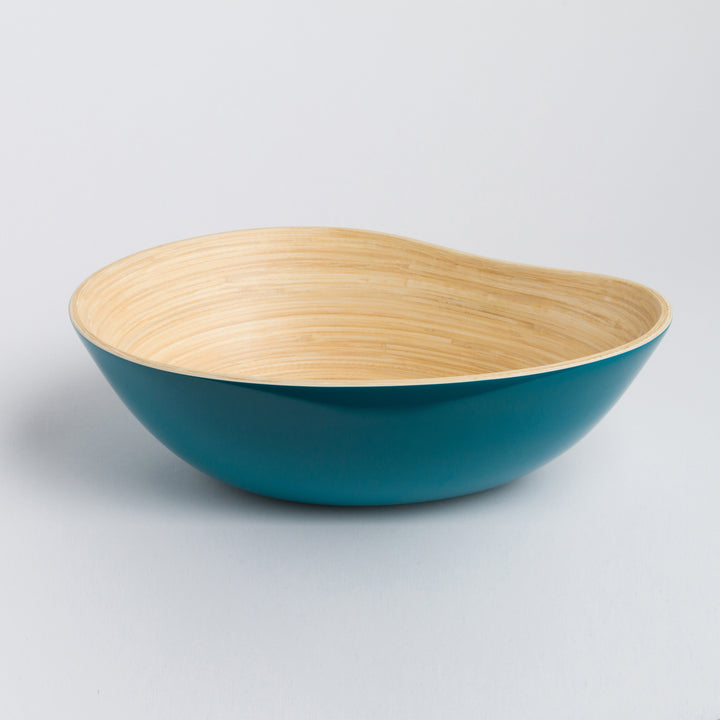 Bamboo serving bowl shaped like a mango, with a natural finish.