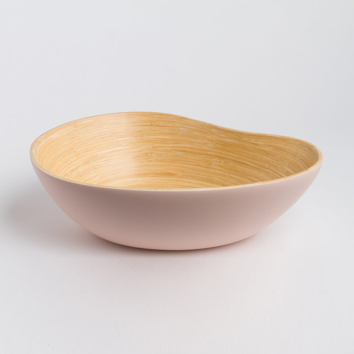 Bamboo serving bowl shaped like a mango, with a natural finish.