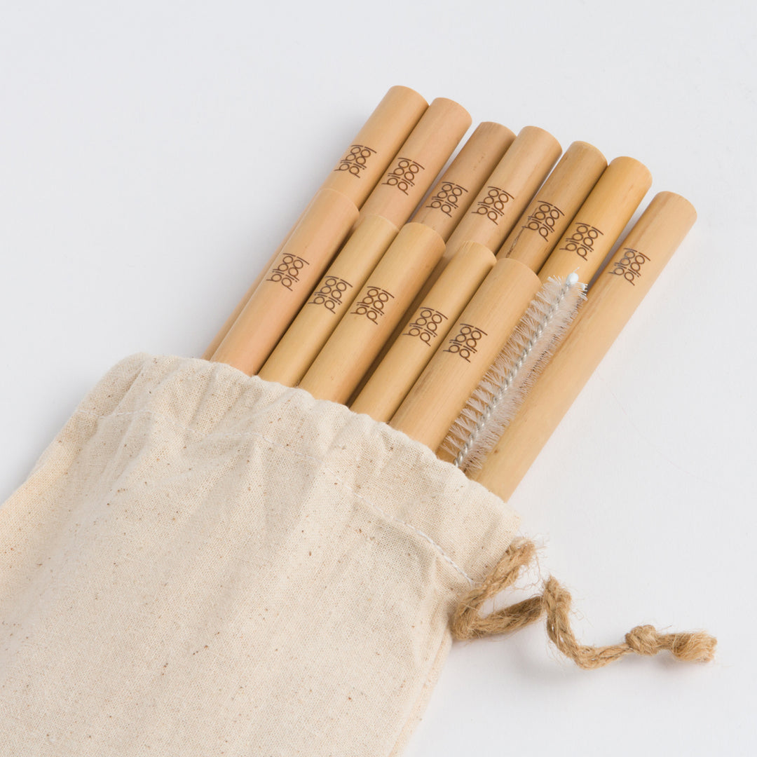 Set of 12 bamboo drinking straws with a cleaning brush.