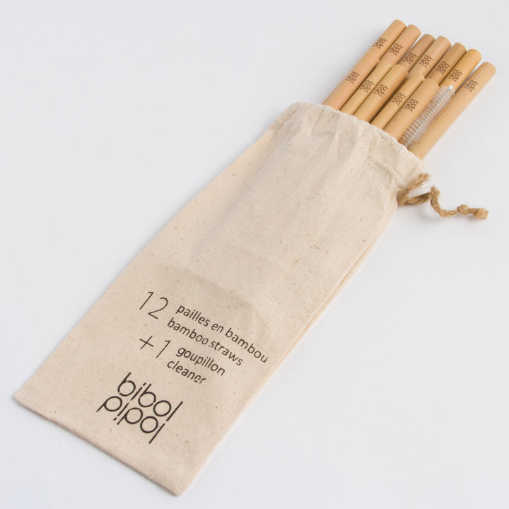 Set of 12 bamboo drinking straws with a cleaning brush, in a natural finish.