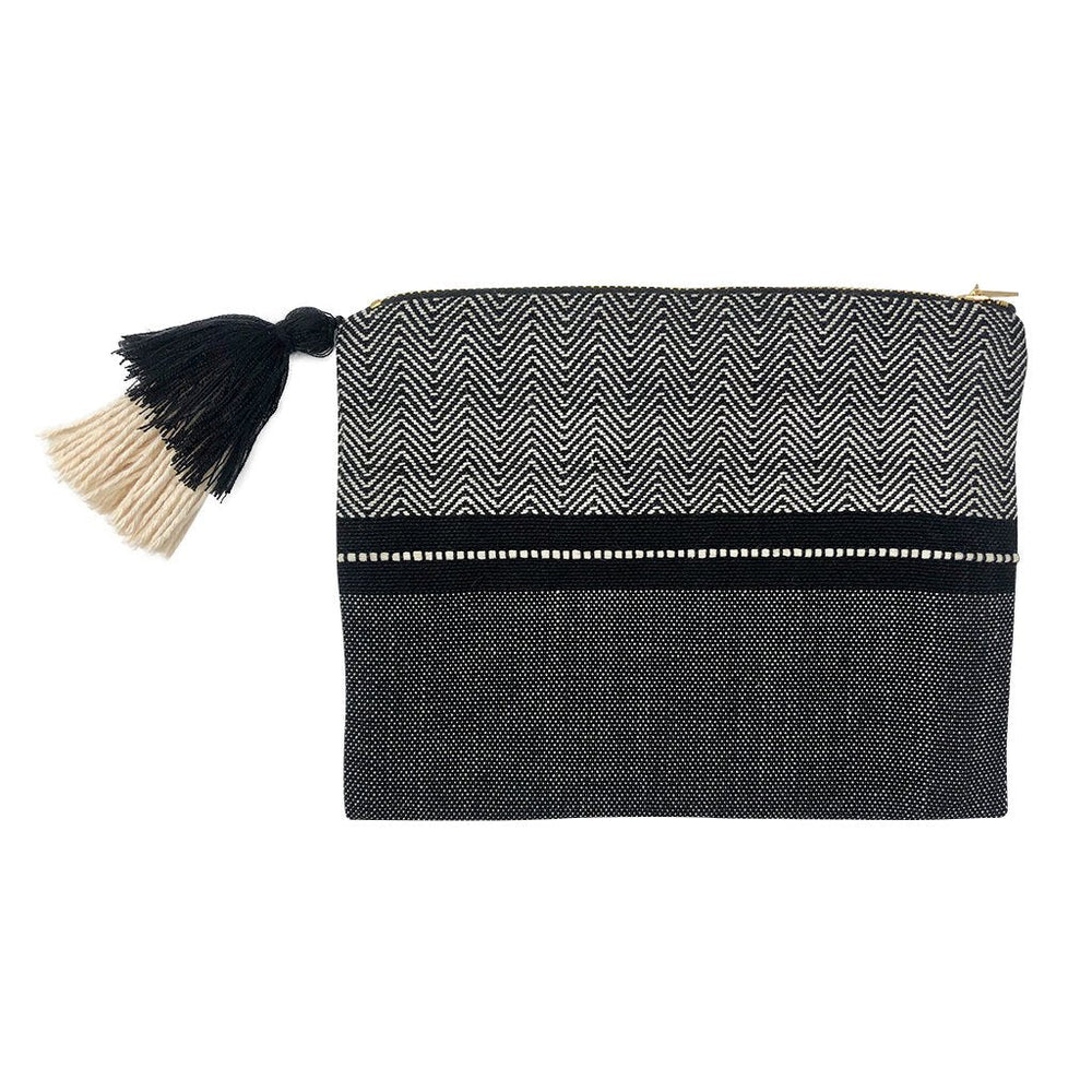 Black handloom stripe cosmetic clutch with a textured woven finish.
