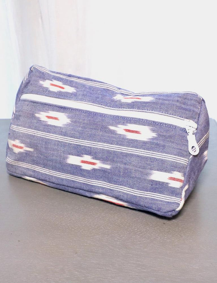 Blue ikat cotton toiletry bag, patterned design.