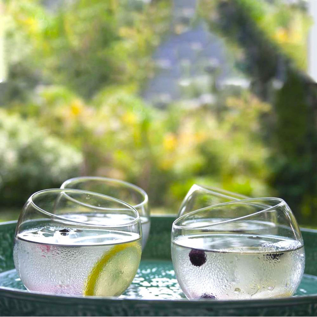 Round recycled glass whiskey tumbler with a clear, smooth finish.
