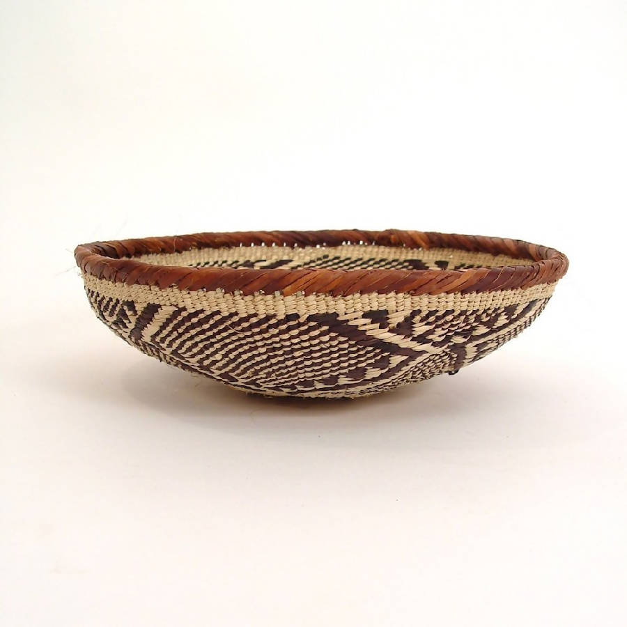Handwoven Tonga basket bowls with natural fibers and fine craftsmanship.