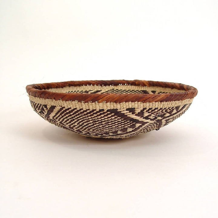 Handwoven Tonga basket bowls with natural fibers and fine craftsmanship.