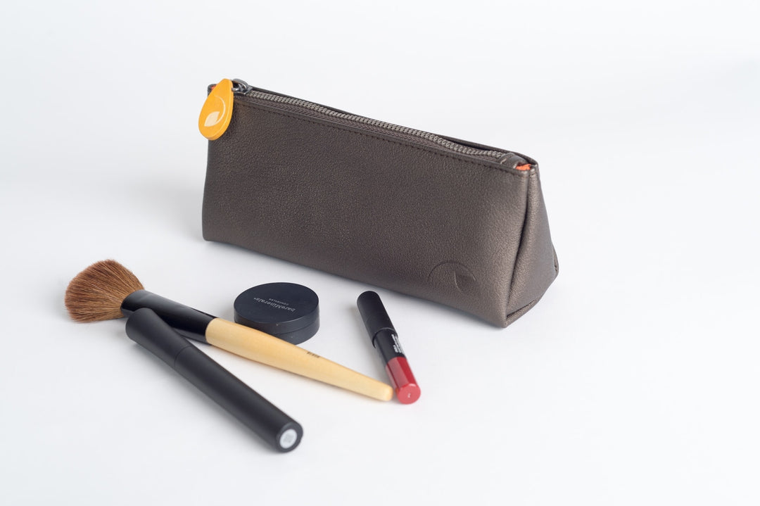 Vegan leather Union makeup pouch for storing cosmetics and accessories.