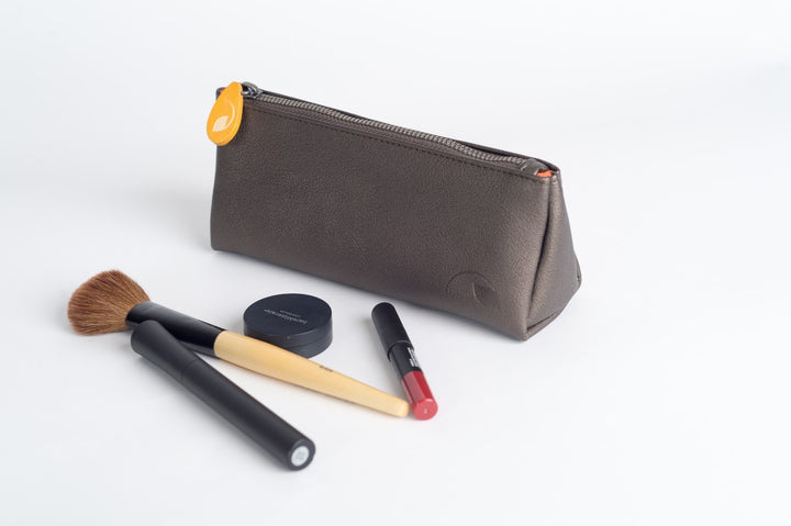 Vegan leather Union makeup pouch for storing cosmetics and accessories.