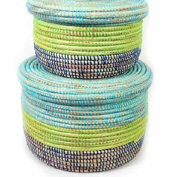 Nesting set of coastal-blue woven storage baskets for home organization.