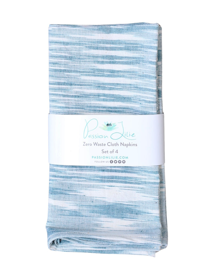 Set of four light blue handwoven cotton napkins.