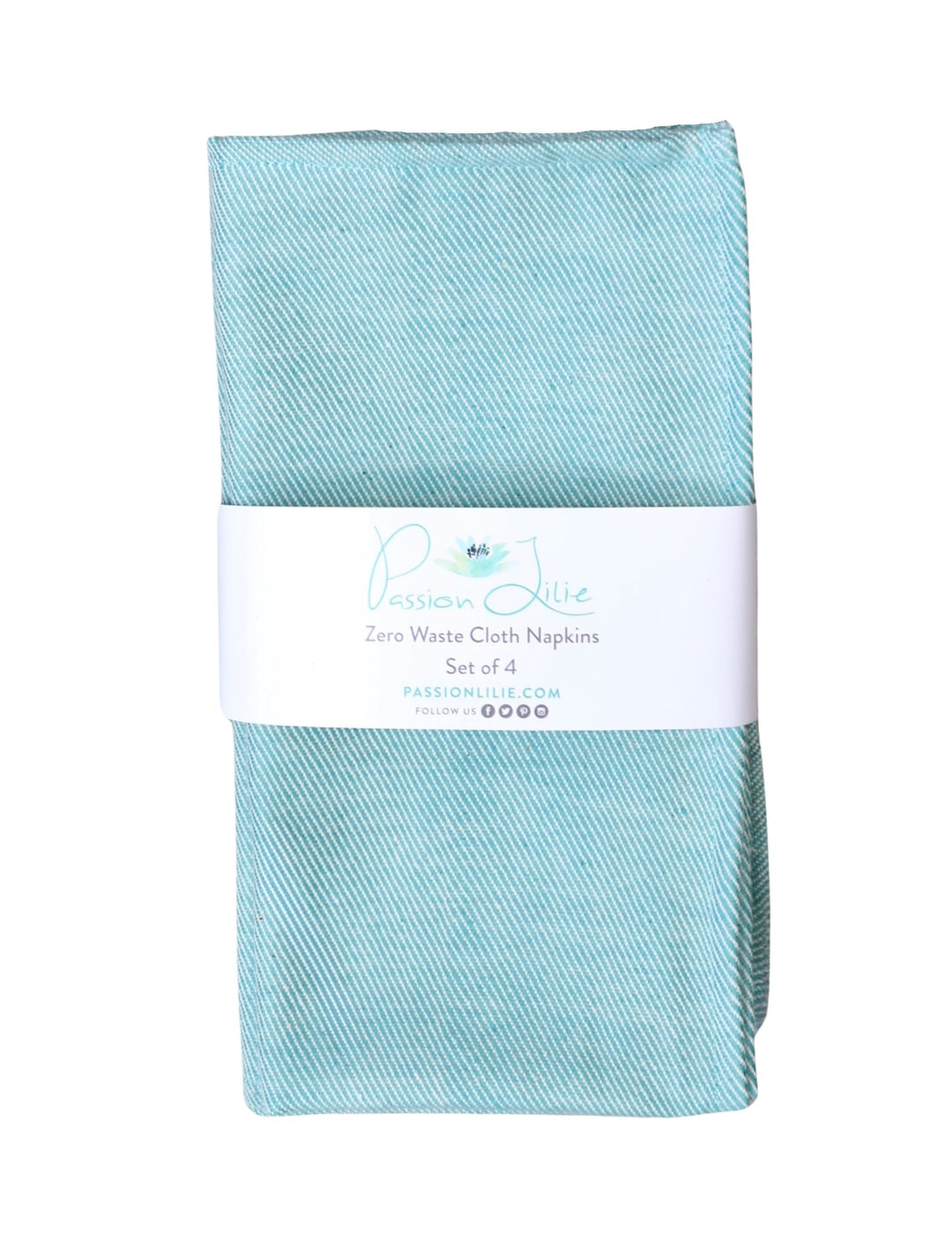 Set of four mint green cotton dinner napkins, folded on a table.