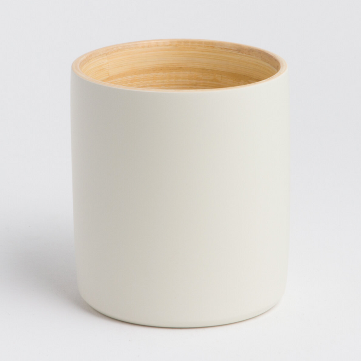 Ly bamboo mug in a natural finish with a smooth surface.